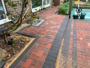 Brindle Block Paved Patio with Charcoal Border in Haywards Heath